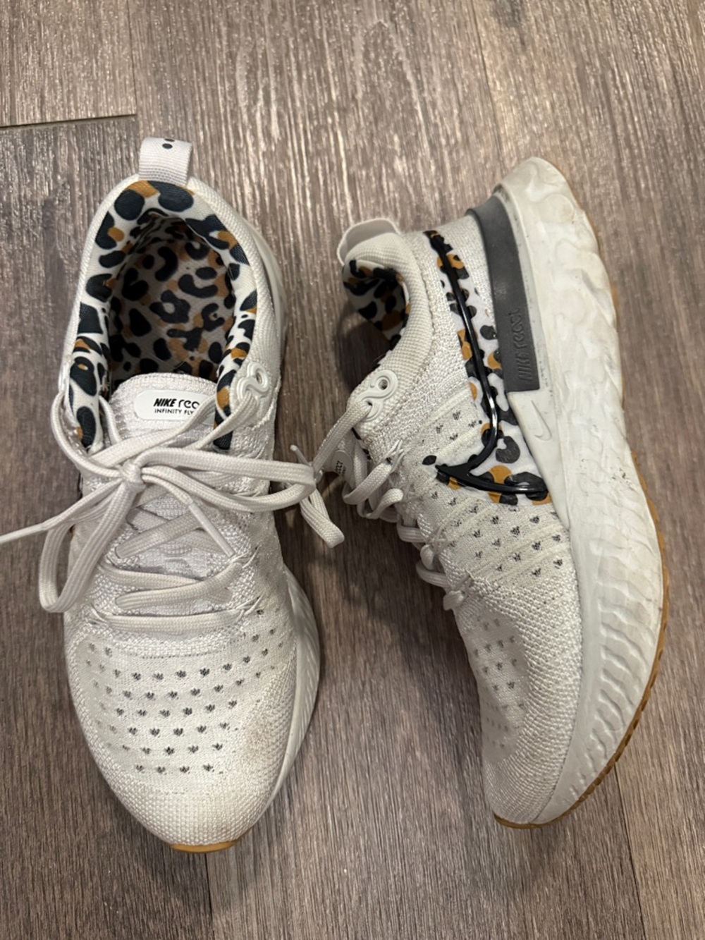 Nike Women’s White Knit Running Shoes with Leopard Accent